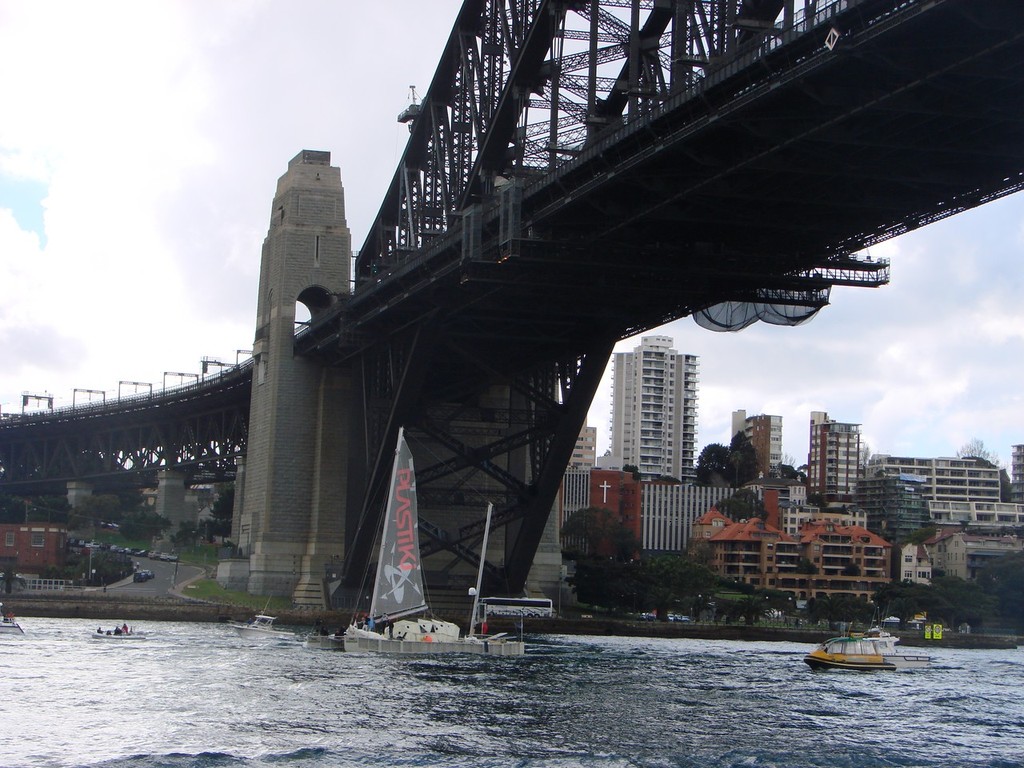 Plastiki arriving under Sydney Harbour Bridge © BW Studios
