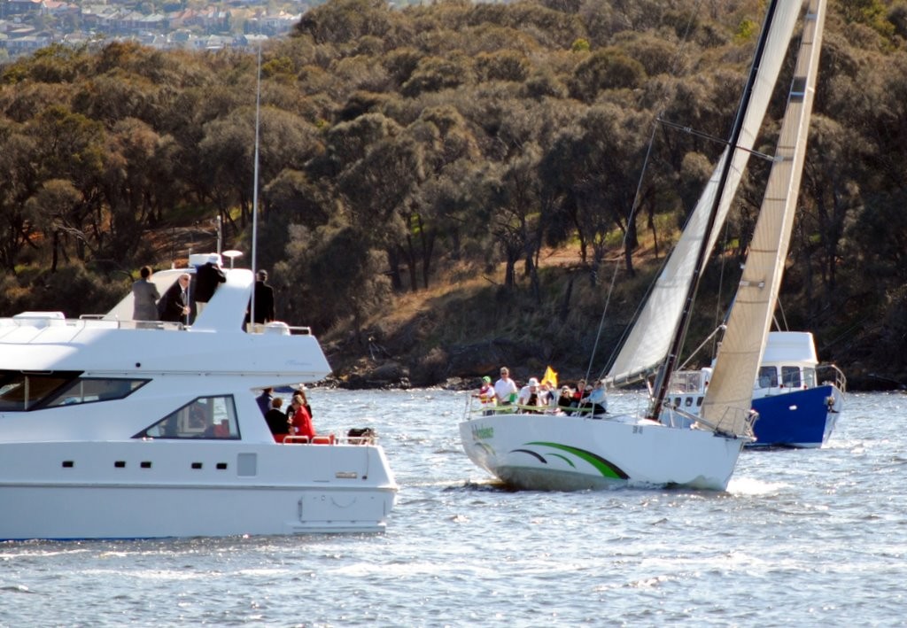 Bellerive Yacht Club Commodore David Creese in his yacht Dekadence leads the fleet as the Governor of Tasmania takes the salute on Opening Day on River Derwent - October 2010 ©  Andrea Francolini Photography http://www.afrancolini.com/