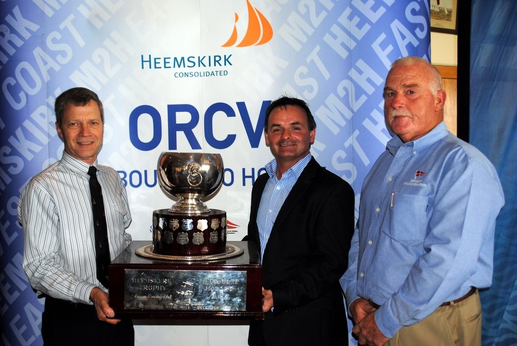 The Melbourne to Hobart Yacht Races, the traditional Westcoaster and the newer Eastcoaster were alos launched at the DSS today.  Ocean Racing Club of Victoria commodore Don Fraser shows the Heemskirk Trophy to Tasmania’s Minister for Infrastructure David O’Byrne and DSS commodore Peter Geeves ©  Andrea Francolini Photography http://www.afrancolini.com/
