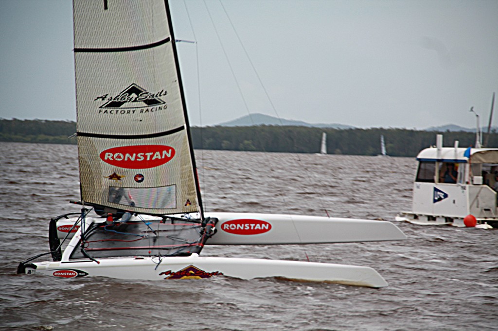 Glenn Ashby crosses the finish line to in win 1st place for the second time today. A very successful day of racing for Ashby for race 3 and 4 - A Cat Nationals 2011 photo copyright Mia Hacker http://www.miahacker.com taken at  and featuring the  class