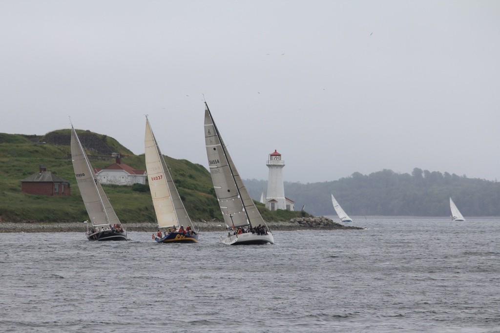 Samaya, Third Wave and Bella J racing towards the Georges Island lighthouse photo copyright Guy Perrin http://sail-world.com taken at  and featuring the  class