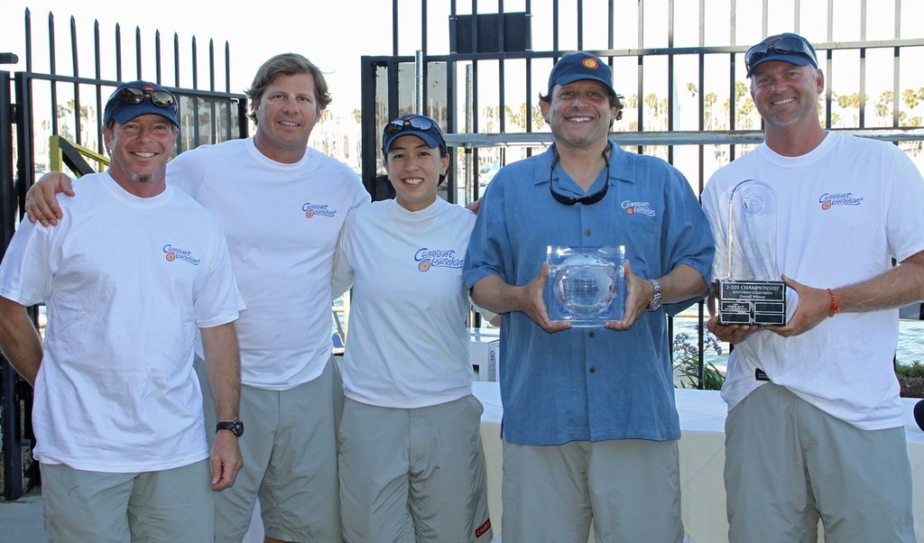 Gary Mozer (blue shirt) and his Current Obsession 2 team show off the hardware for winning the 2010 J/105 SoCal Championship. &copy; Rick Roberts 
