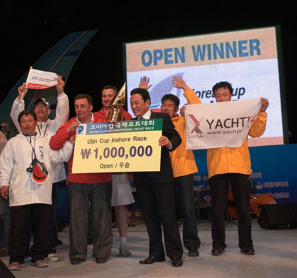 Smile! You just became a millionaire! Yacht In 350, Open Class winner. Korea Cup International Yacht Race 2010 © Guy Nowell http://www.guynowell.com