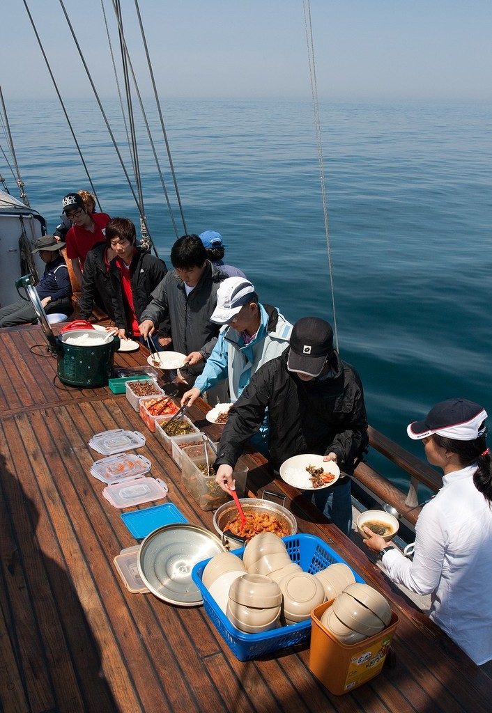 Lunch watch. Korea Cup International Yacht Race 2010. © Guy Nowell http://www.guynowell.com
