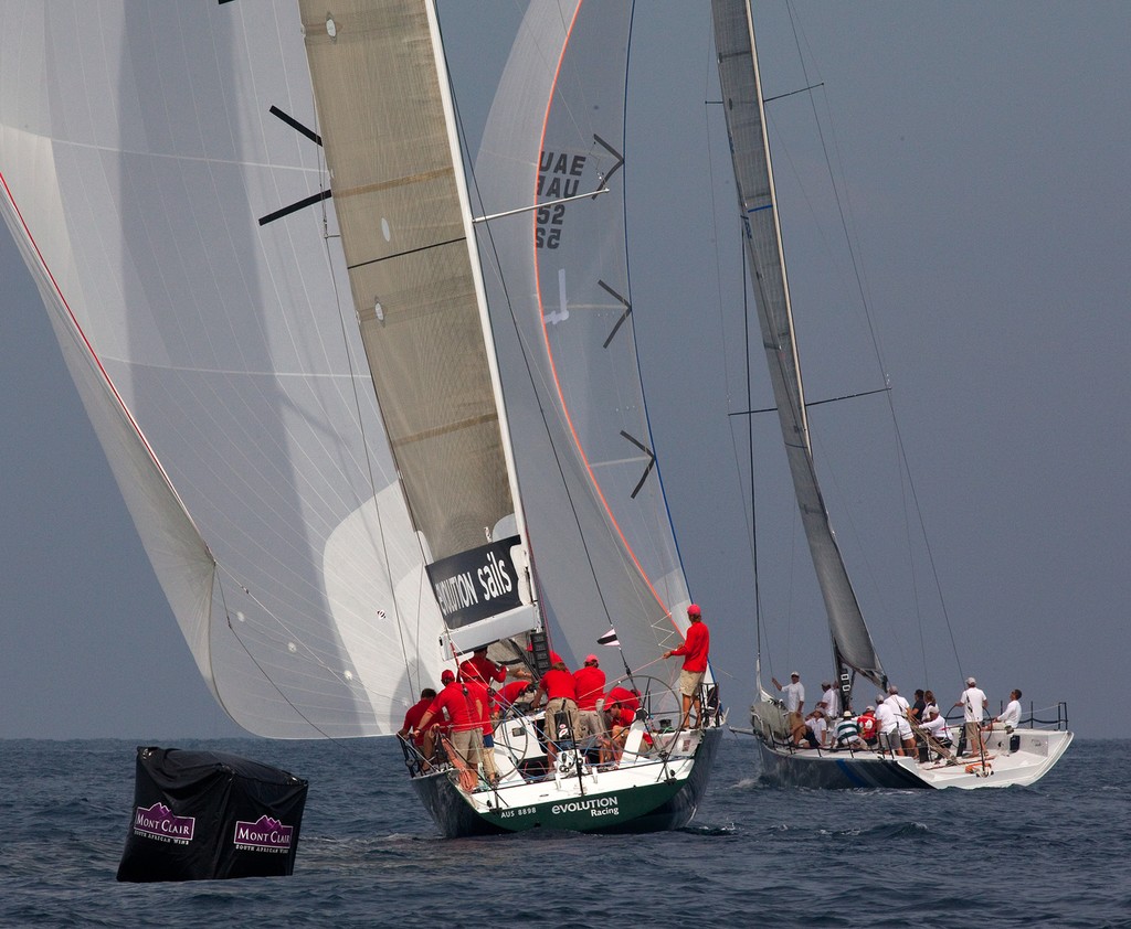Evolution Racing chases Team Premier at the first windward mark.  Phuket King’s Cup 2010. © Guy Nowell http://www.guynowell.com