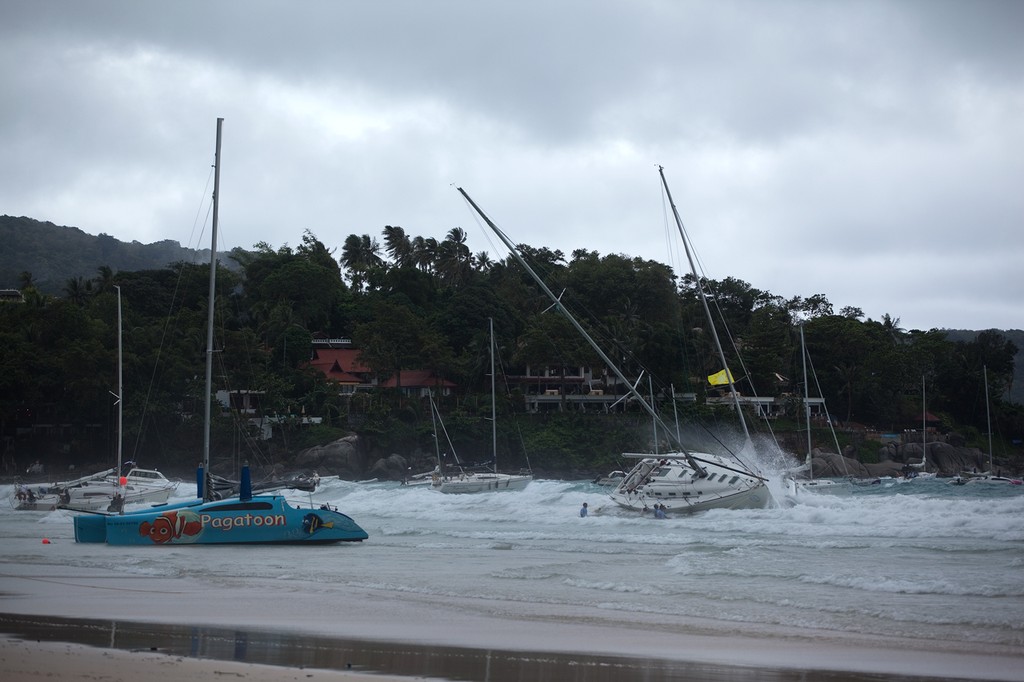 Ichiban takes a pounding in the surf. Phuket King’s Cup 2010. © Guy Nowell http://www.guynowell.com