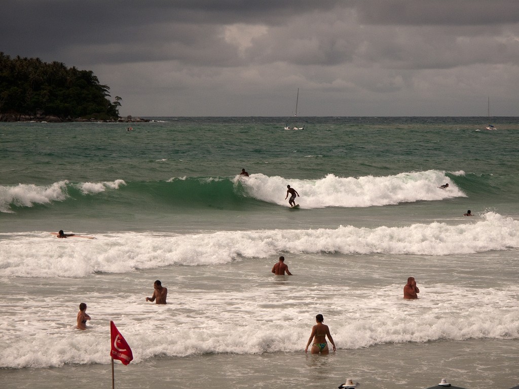 Surf’s up! At least someone is enjoying the weather on the last day of the Phuket King’s Cup 2010. &copy; Guy Nowell http://www.guynowell.com