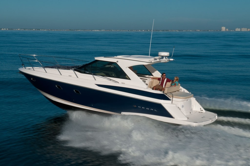 Regal's all-new Sport Coupe', the stylish 42' (12.9-metres) slashes across blue water. photo copyright Regal Marine taken at  and featuring the  class