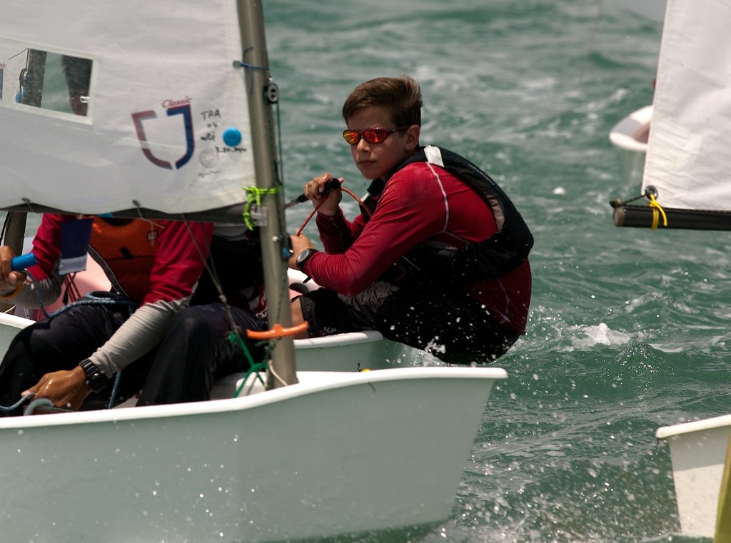 Oppie sailors have cool dude shades, too. Cosmas Grelon (HKG). Top of the Gulf Regatta 2010, Thai National Champs. © Guy Nowell http://www.guynowell.com
