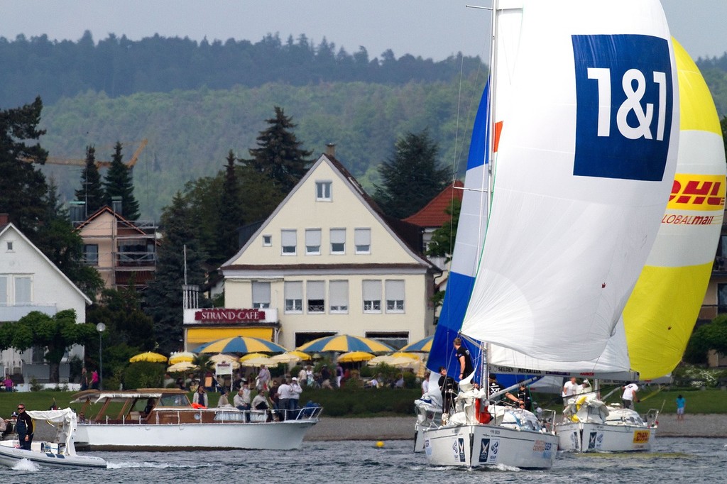 Torvar Mirsky leads Bjorn Hansen away from the shore during their match on day 3 of Match Race Germany 2010. World Match Racing Tour. Langenargen, Germany. 22 May 2010. Photo: Gareth Cooke/Subzero Images/WMRT © WMRT http://www.worldmatchracingtour.com