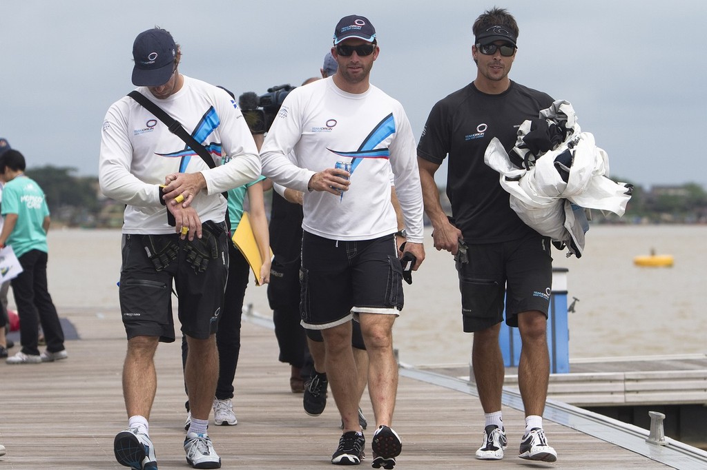 Newly crowned World Match Racing Tour Champion Ben Ainslie (C) walking off the dock during the finals of the Monsoon Cup 2010. World Match Racing Tour, Kuala Terengganu, Malaysia.  © Subzero Images /AWMRT http://wmrt.com
