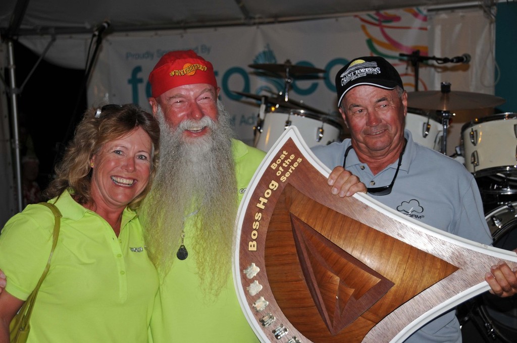  John and Kim Clinton were  presented with the Boat Of The Series trophy by Hog’s Breath cafe founder, Don Algie in 2010 © John Daffy - BluePRINT Public Relations