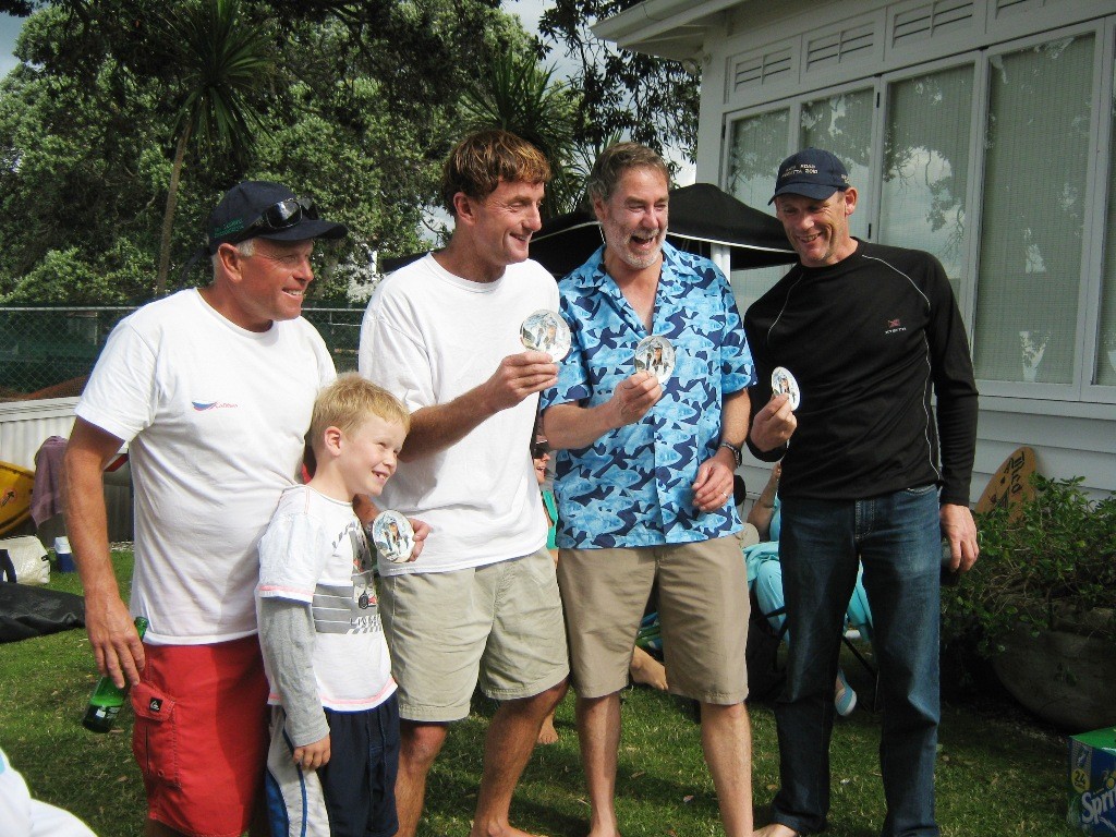 Heat Winners, from the left – Robbie Naismith and son Lochy, Ian Gladwell, Peter Thomas, Luuk Batenburg. Lochy is our youngest ever heat winner. 
Rata Road Regatta, Cheltemham Beach, March 2010 photo copyright Event Media taken at  and featuring the  class