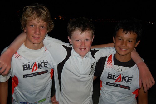 Patrick Haybittle (Centre) gives souvenir Sir Peter Blake Race Bibs to 2nd and 3rd placed sailors, Noumeans Guillaume Esplaas and Cyril Fortin after prize giving. © Brian Haybittle