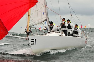 J/80 Worlds 2003 Champion Jay Lutz rounding leeward mark in race four. - J/80 Worlds 2010 photo copyright Allen Clark http://www.photoboat.com taken at  and featuring the  class