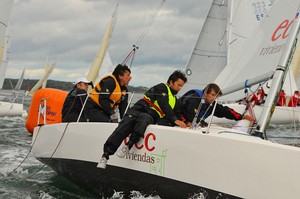 Pichu Torcida's team ECC VIVIENDAS rounding windward mark at J/80 Worlds Newport - J/80 Worlds Newport photo copyright Allen Clark http://www.photoboat.com taken at  and featuring the  class