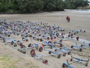 Beach trailers scattered along the beach photo copyright Daniel Johnston taken at  and featuring the  class