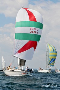 Folichon (foreground), a C&C 34 is skippered by Ian McAllister. A member of Port Credit Yacht Club since 1969 is participating in his 11th consecutive Lake Ontario 300 July 17, 2010. SAIL-WORLD.com/Jeff Chalmers (PORT CREDIT, Ont) - Lake Ontario 300 photo copyright Jeff Chalmers taken at  and featuring the  class
