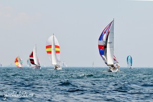 Folichon (foreground), a C&C 34 is skippered by Ian McAllister. A member of Port Crdit Yacht Club since 1969 is participating in his 11th consecutive Lake Ontario 300 July 17, 2010. SAIL-WORLD.com/Jeff Chalmers (PORT CREDIT, Ont) - Lake Ontario 300 - Jeff Chalmers    - 2010 Lake Ontario 300 photo copyright Jeff Chalmers taken at  and featuring the  class