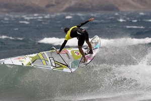 Brawzinho one handed shaka - PWA Pozo Izquierdo photo copyright  John Carter / PWA http://www.pwaworldtour.com taken at  and featuring the  class