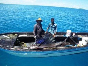 Buying a sailfish with cigarettes and coke.JPG photo copyright Rolf and Irene Fricke taken at  and featuring the  class