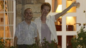 Chandlers wave to reporters at the British High Commission in Nairobi - they are now grieving Paul&rsquo;s father who died in July photo copyright  SW taken at  and featuring the  class