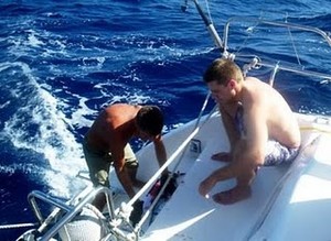 Fish cleaning on the 'back terrace'.JPG photo copyright Rolf and Irene Fricke taken at  and featuring the  class