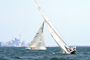 Crossing tacks and Toronto skyline photo copyright Joaquim Santos http://www.eye4photos.ca taken at  and featuring the  class