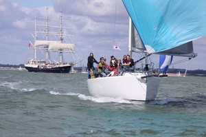 J-133 Jump with TS Tenacious in background photo copyright Eddie Mays - copyright http://www.eddiemays.com taken at  and featuring the  class