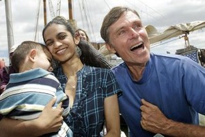 Sailor Reid Stowe, right, smiles after he landed his 70-foot schooner ``Anne`` in New York and was reunited with his girlfriend Soanya Ahmad, and their son Darshen, 23 months, whom he'd not yet seen, in New York, Thursday, June 17, 2010.  Stowe spent 1152 days at sea on what he refers to as a ``voyage of love,`` but the couple hadn't seen each other since Soanya became pregnant with their son and was rescued at sea. (AP Photo/Kathy Willens) photo copyright SW taken at  and featuring the  class
