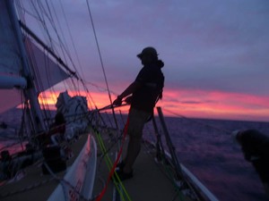 Rob Collins trimming at sunset on Spirit of Australia - Clipper 09-10 Round the World Yacht Race photo copyright Clipper Ventures PLC . http://www.clipperroundtheworld.com taken at  and featuring the  class