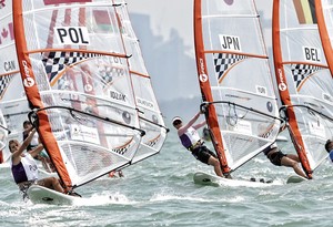 Competitor sails off at the start of the Techno 293- girls' windsurfer at the Singapore 2010 Youth Olympic Games (YOG) held at the National Sailing Centre, Aug 23, 2010. Photo: SPH-SYOGOC/Imran Ahmad photo copyright ISAF  taken at  and featuring the  class