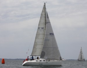 The Healer slipping gently around the bottom mark in race one - Ensign Yachts QLD Beneteau Cup photo copyright Tracey Johnstone taken at  and featuring the  class