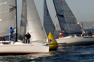 The Flying Tiger fleet rounds the windward mark - San Diego Yachting Cup 2010 photo copyright David J. Shuler taken at  and featuring the  class