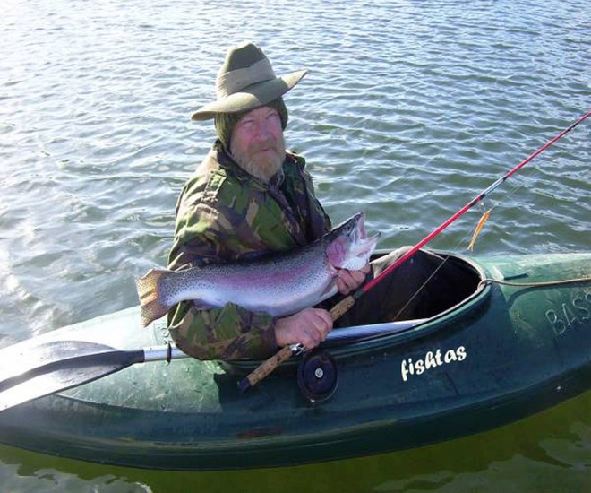 Steve Pike with a thumper rainbow. - Tasmanian fishing feature © Carl Hyland