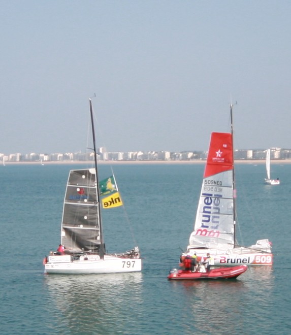 Hoisting the mainsail under tow - Pornichet Select © scott cavanough