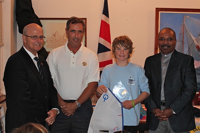 Rory Caslin accepts the Bermuda National Optimist trophy. - 2011 Bermuda Open and National Championship © somers cooper