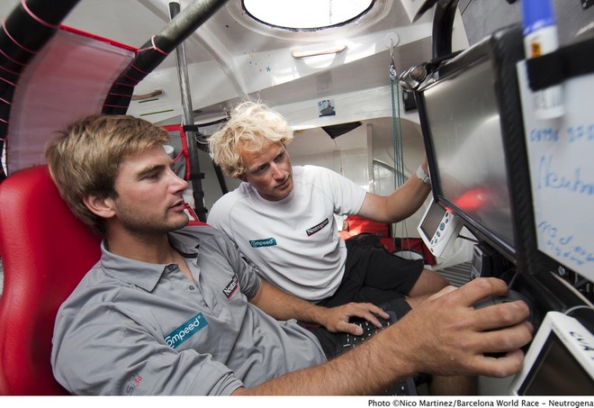 Herrmann (left) and Breymaier in the navigation station  - Barcelona World Race © Nico Martinez http://www.nicomartinez.com