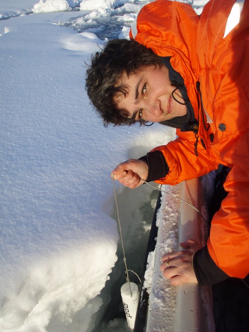 WHOI physical oceanographer Fiamma Straneo lowers a Conductivity/Temperature/Depth Recorder (CTD) into Sermilik Fjord in March 2010. (Kjetil Vage WHOI) © Woods Hole Oceanographic Institution (WHOI) http://www.whoi.edu/