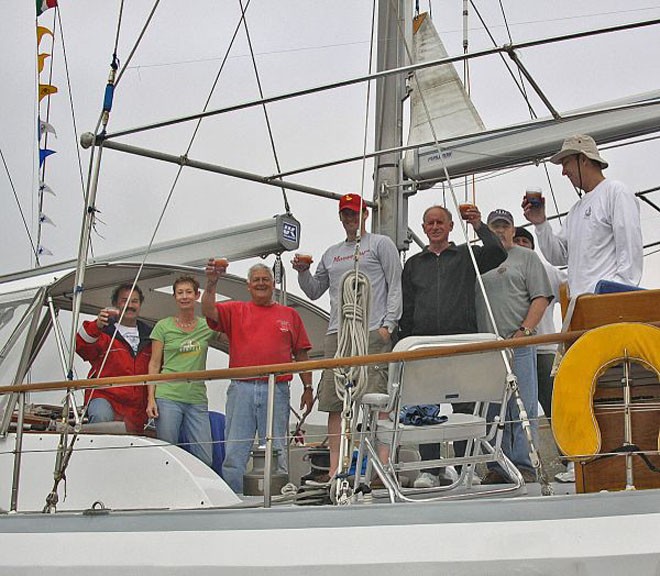 Golden Skye         skipper Richard Mulvania (red shirt) and family crew finished their 32nd N2E early Sunday - Newport to Ensenada ©  Jack Daniels