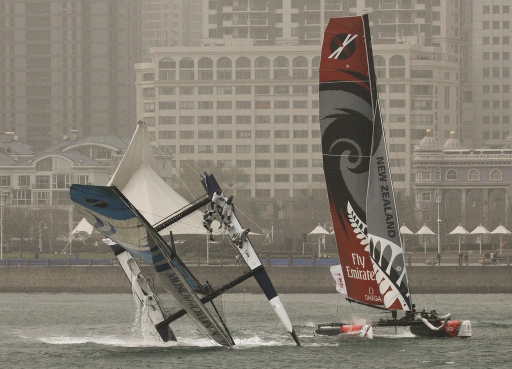 The Extreme Sailing Series 2011. Act 2. Qingdao. China  
Pictures of The Wave Muscat capsizing on day 2 of racing  
Credit: Sui Zhi Qiang/Lloyd Images  
 photo copyright Lloyd Images http://lloydimagesgallery.photoshelter.com/ taken at  and featuring the  class