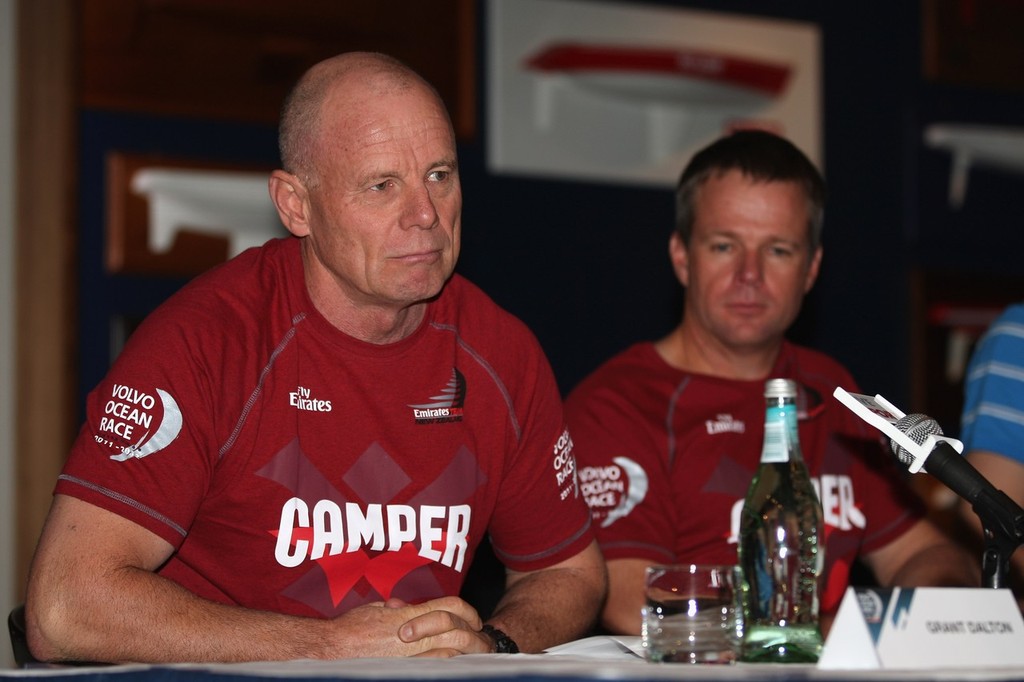 Chris Nicholson, Skipper of Camper looks on as Grant Dalton, Managing Director of Emirates Team New Zealand speaks during the Auckland Port’s farewell press conference at the Royal New Zealand Yacht Squadron on July 20, 2011 in Auckland, New Zealand.   © Getty Images