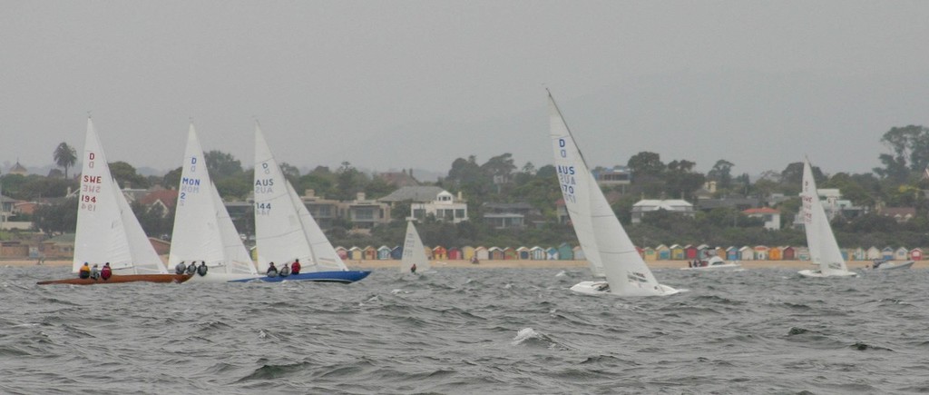 The Dragons go in front of Brighton’s iconic bathing boxes - Dragon World Championships &copy;  John Curnow