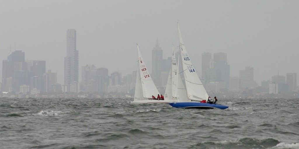 On a grey day, the Dragons go in front of Melbourne’s CBD/ - Dragon World Championships &copy;  John Curnow