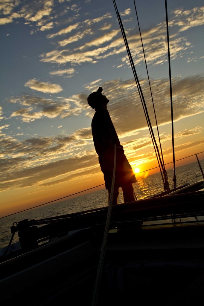 Paul Hermanson trims spin as the sun goes down - 103rd Race to Mackinac © Sean Palizza