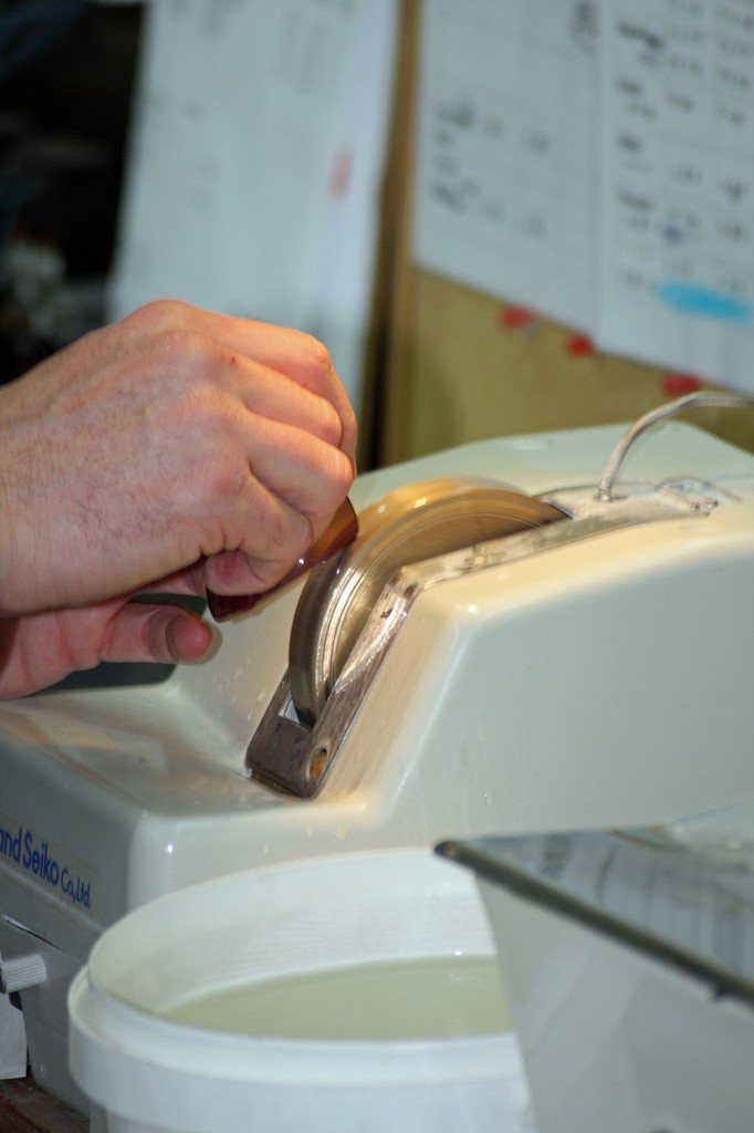 Once cut, the lenses are ground removing any excess glass fragments. - Protect you eye's with Spotters Platinum © Jarrod Day