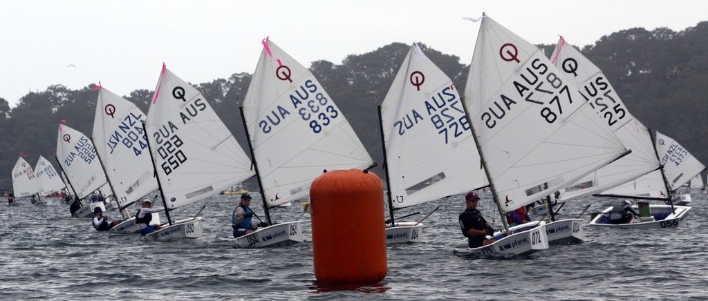 The Open Fleets pink and white groups coming to the bottom gate - 2011 International Optimist Australian & Open Championship photo copyright Damian Devine taken at  and featuring the  class