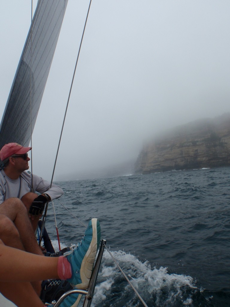 Crew of Next huddle on leeward rail in the painfully light winds - Australia Day Race to Botany Bay - City of Sydney Cup, 26 January 2011 photo copyright Wai Lee taken at  and featuring the  class