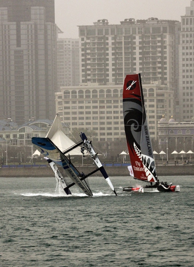 The Wave Muscat capsizing on day 2 of racing - Extreme Sailing Series Act 2<br />
(Sui Zhi Qiang) &copy; Lloyd Images http://lloydimagesgallery.photoshelter.com/