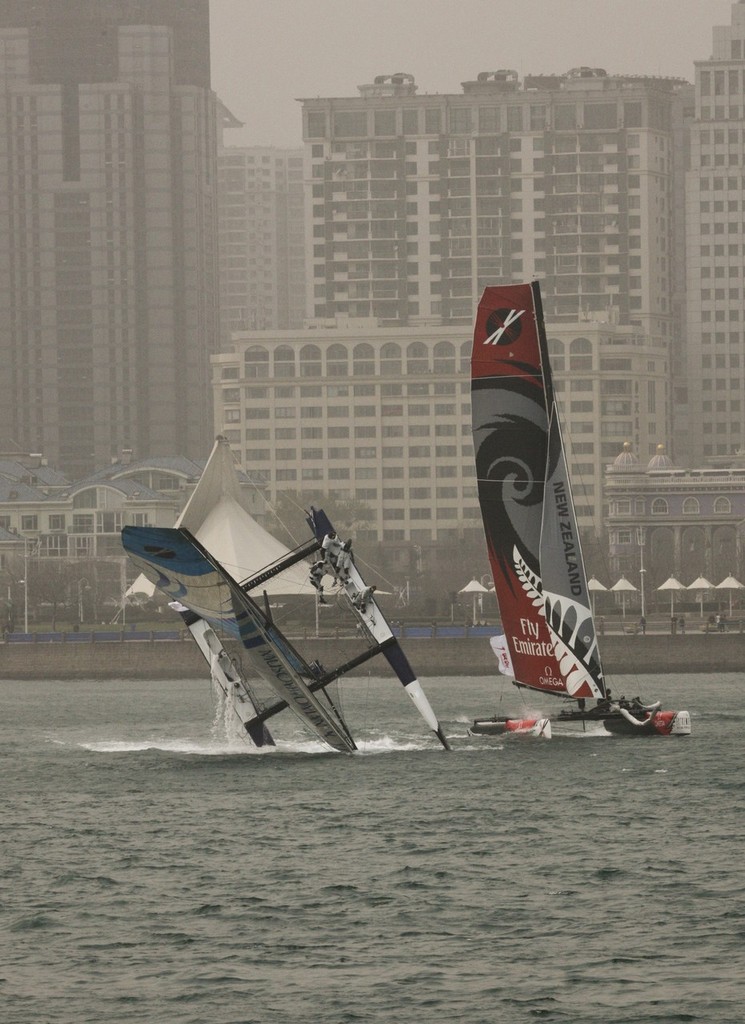 The Wave, Muscat capsize in Race 2 - Extreme Sailing 2011 - Day 3, Qingdao © Sui Zhi Qiang/Lloyd Images photo copyright Lloyd Images http://lloydimagesgallery.photoshelter.com/ taken at  and featuring the  class